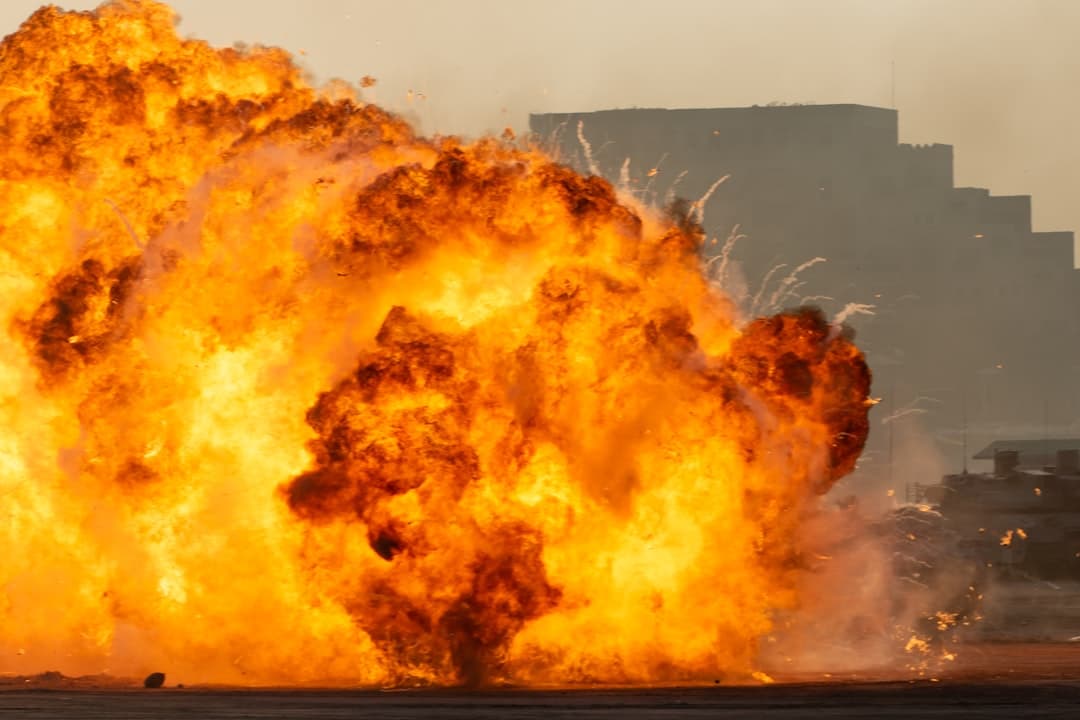 Massive fire explosion close up in military combat and war. Vehicle explosion from a tank in a city in the Middle East. Military Concept. Strength, power, explosion.
