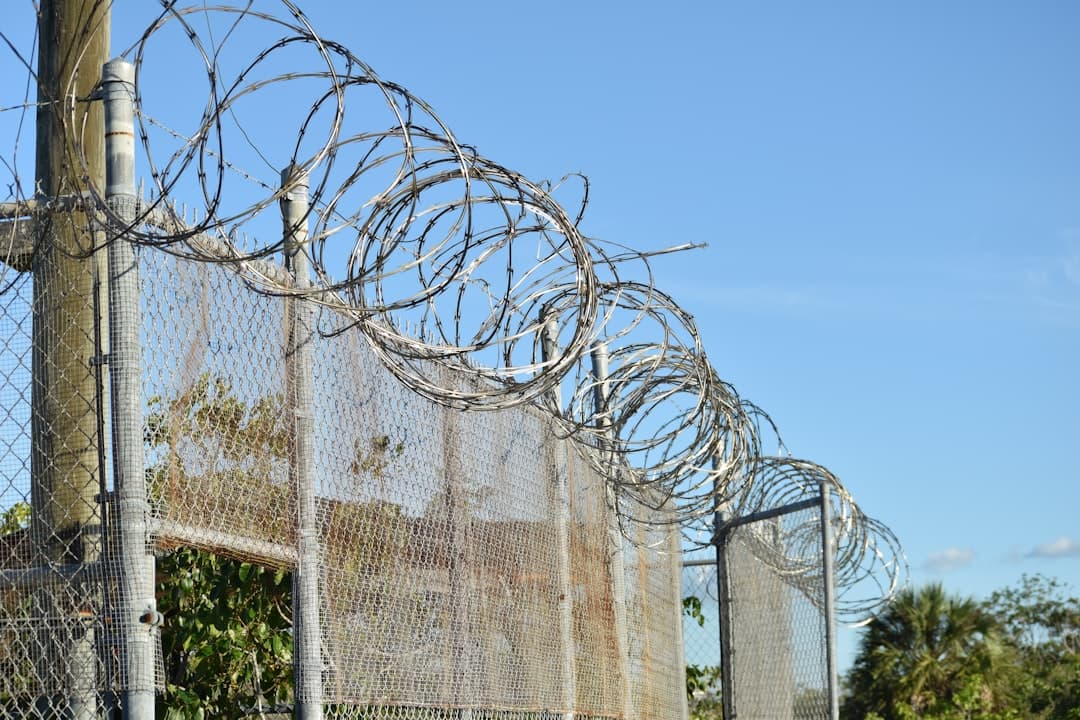 Barbed wire fence of an abandoned youth camp.