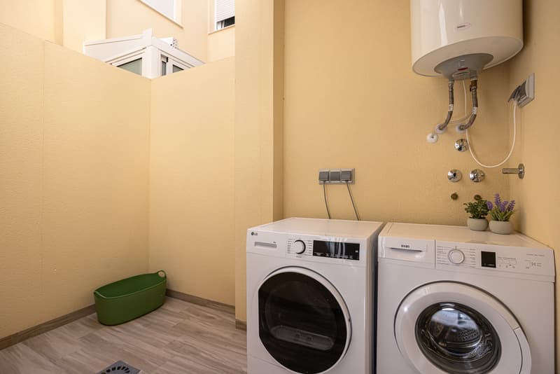 Laundry Area with Washer and Dryer in Patio