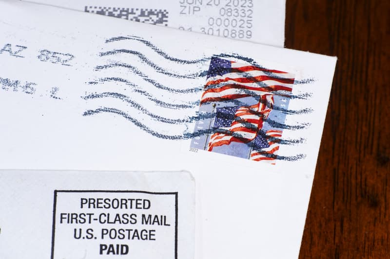 Lake Elsinore, CA, USA - July 9, 2023: Cancelled US postage stamp on envelope