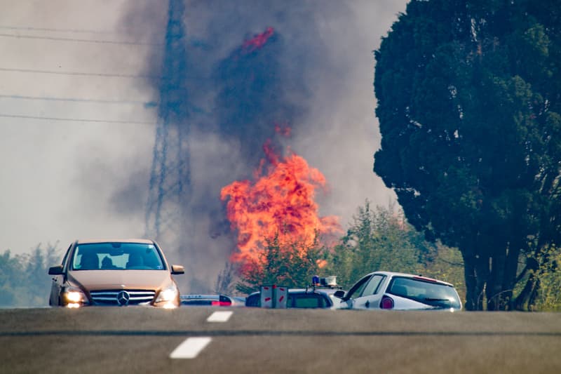 Highway with Cars and Distant Fire in Bar, Montenegro