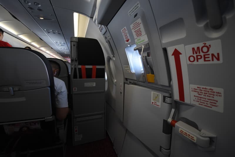Emergency exit inside a plane of a Vietnamese company