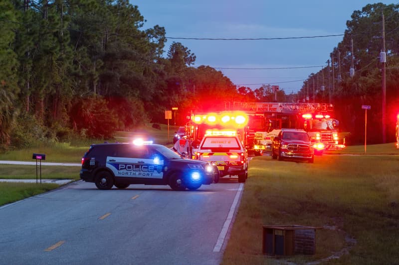 Emergency service personnel responding to potential fire hazard at Florida home. First responders ready to extinguish