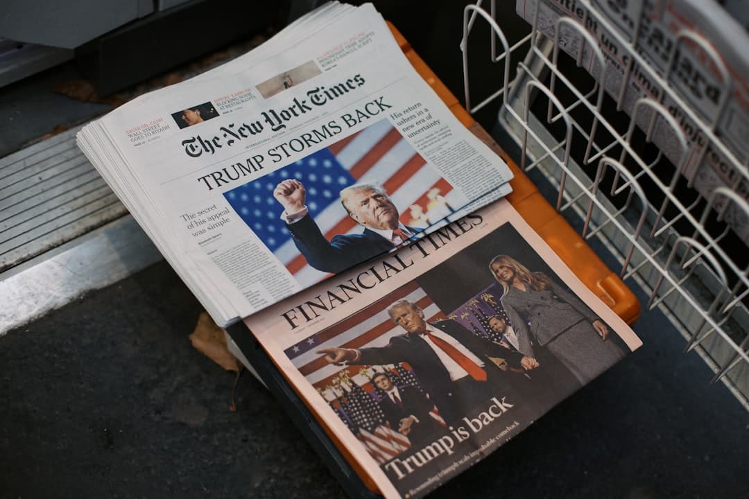 The New York Times and Financial Times newspapers on the stand in Paris, France